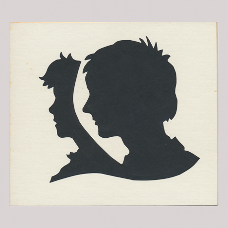 
        Front of silhouette, with two boys looking left, between the boy close-up and the one in the background there is a space.